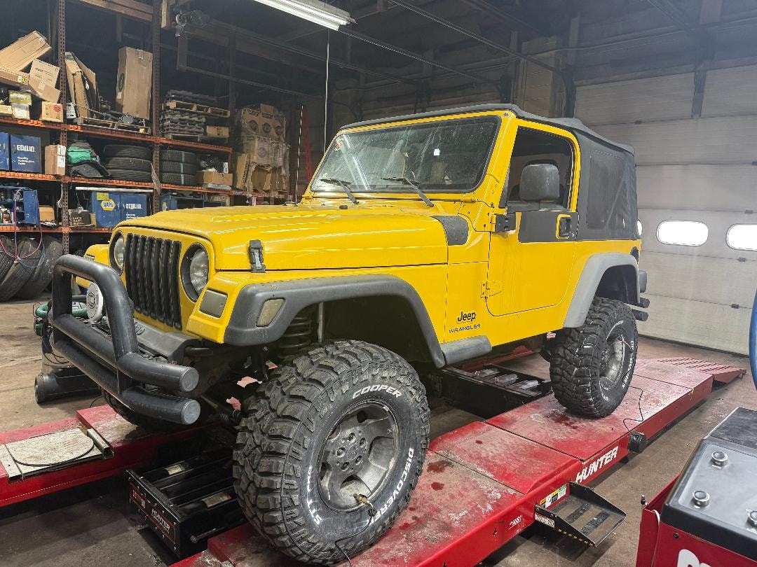 Yellow Jeep Wrangler Frame-Off
